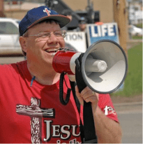 Forced Birther Screaming in Women's ears with Megaphone